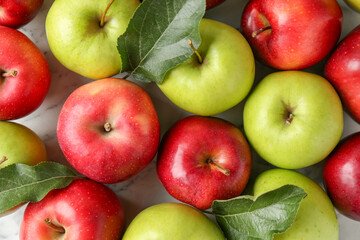 Ripe red and green apples on table, flat lay