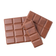 Pieces of delicious milk chocolate isolated on white, top view