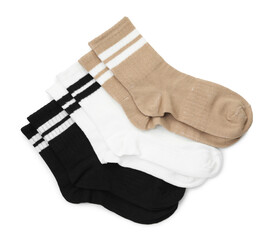 Pairs of soft socks isolated on white, top view