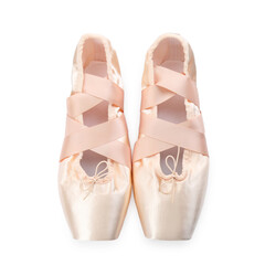 Pair of beautiful beige pointe shoes isolated on white, top view