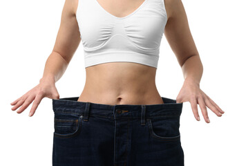 Weight loss. Woman wearing big jeans on white background, closeup