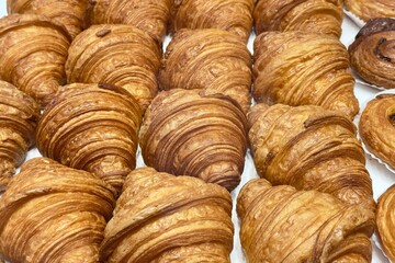 croissant on a wooden board