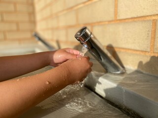 person washing hands