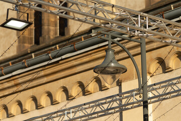 This image showcases a detailed view of a street light fixture alongside the architectural elements...