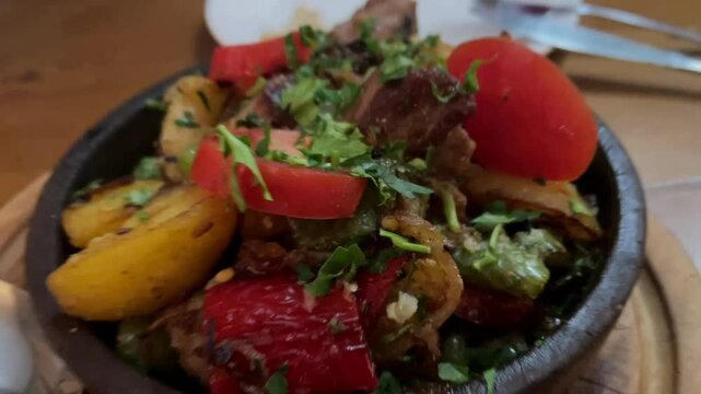 Authentic Georgian Ojahuri Dish in a Clay Skillet Ketsi with Tender Meat, Vegetables, and Traditional Spices, Perfect for Culinary and Cultural Concepts