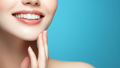 Fototapeta premium Close-up of a smiling woman against a bright blue background, hand touches her chin, commercial photography.
