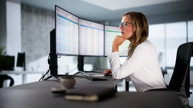 Unhappy Medical Doctor Doing Spreadsheet Codes