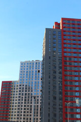 Naklejka premium modern new buildings, apartment buildings and offices in the city, skyscrapers