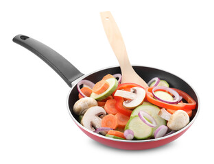 Frying pan with mix of fresh vegetables, mushrooms and spatula isolated on white