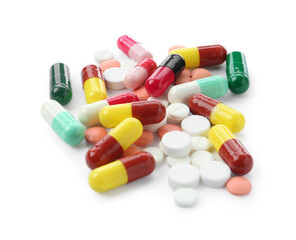 Many different colorful pills isolated on white