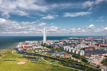 Aerial summer skyline cityscape of Central Malmö, Scania, Sweden. Turning Torso tower is the famous landmark of the city.
