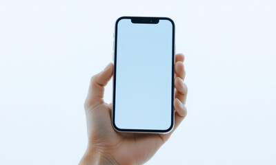hand holding smartphone with blank screen against plain background, showcasing modern technology and connectivity
