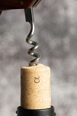 Detail of the cork and corkscrew when opening the wine
