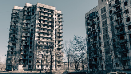 destroyed and burned houses in the city in Ukraine