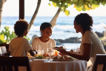 Family dines by the beach at sunset
