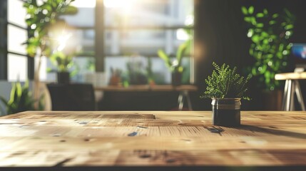 Fototapeta premium Wooden table with plant, sunlit office background