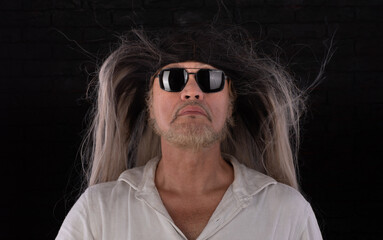 the wind blows the old man hair