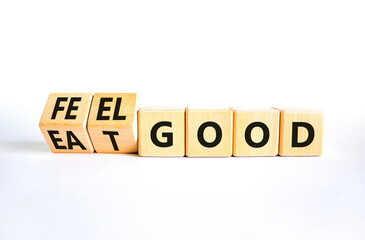 Eat and feel good symbol. Concept words Eat good Feel good on wooden cubes. Beautiful white table...