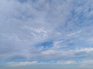 A beautiful sky filled with wispy clouds and a calm atmosphere, perfect for a serene background or nature-themed project.