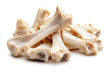 Pile of chicken bones on a white background