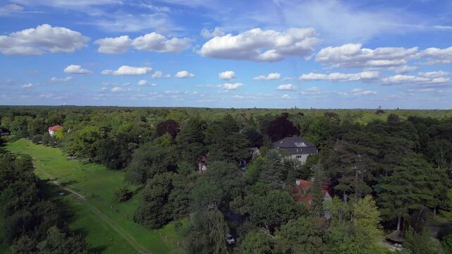 residential district green forest cloudy sky. Beautiful aerial view flight drone