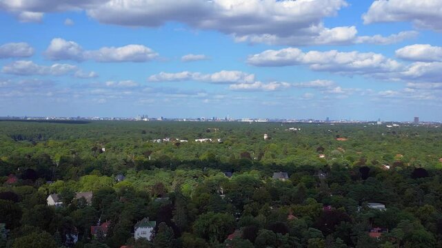 residential district green forest cloudy sky. Unique aerial view flight drone