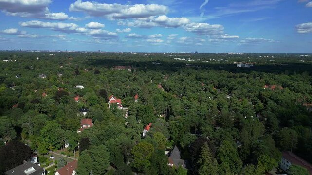 residential district green forest cloudy sky. Fantastic aerial view flight drone