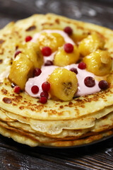 Pancakes with yogurt and banana