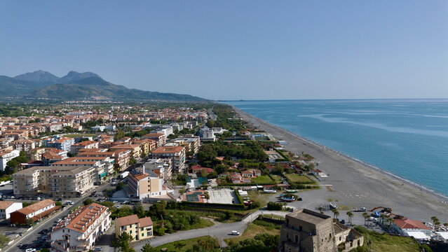 aerial view of the city of Scalea and its old unused bridge and iconic Talao tower -