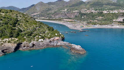 Spectacular aerial view of Dino's island of Praia a Mara city with blue and transparent sea on summer time lights