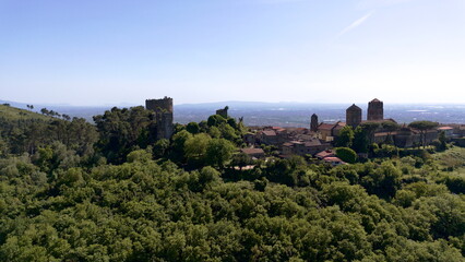 Aerial view of the medieval town of Casertavecchia with the castle and the Christian cross on the top of the nearby hil