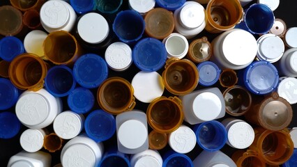 Medical waste. Empty pills bottles or packs for medications. Disposing empty medication containers made of plastic. Hospital waste. Pharmaceutical industry. Overbooked hospitals treatments.