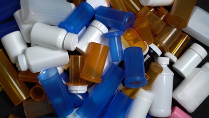 Medical waste. Empty pills bottles or packs for medications. Disposing empty medication containers made of plastic. Hospital waste. Pharmaceutical industry. Overbooked hospitals treatments.