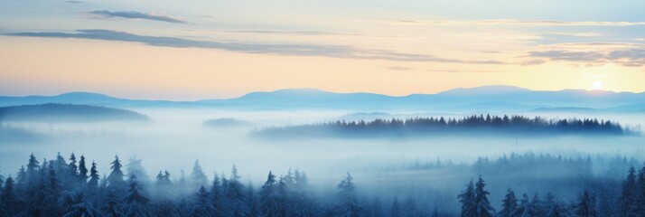 Obraz premium Stunning Morning Landscape Capturing Misty Forest and Majestic Mountain Range Illuminated by Beautiful Sunrise with Soft Hues and Serene Atmosphere in Tranquil Wilderness