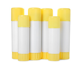 Many different glue sticks isolated on white