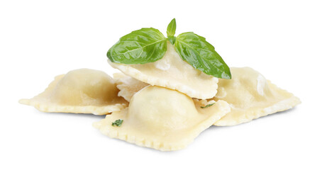 Delicious ravioli with cheese and basil isolated on white