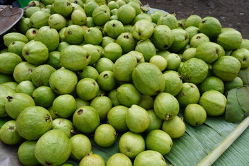 Fresh guavas kept on the banana leaf