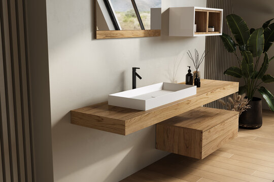 A floating wooden vanity with a rectangular white basin and a sleek black faucet. This modern bathroom design incorporates natural decor elements for a refined and functional aesthetic.
