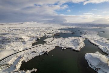Icelandic aerial photography captured by drone. Beautiful landscape in the Myvatn lake in the north of Iceland, near Krafla volcano. Frozen trees cooverd by snow.