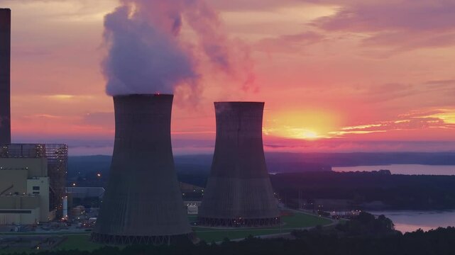 Aerial Drone Shot of Coal Nuclear Power Plant on a Georgia Lake at Sunset