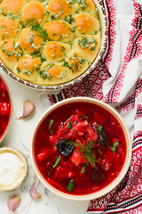 Traditional Ukrainian borsch with pampushki .style rustic