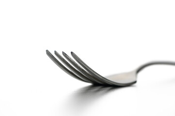 Delicate fork resting on a minimalist surface inviting culinary creativity