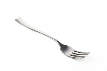 Unique metal fork lying on a white surface showcases simple elegance and modern design