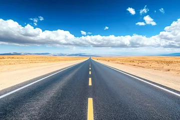 Fototapete Rund Open road stretching through a vast desert landscape under a bright blue sky with white cumulus clouds, offering a sense of freedom and adventure © Oleh