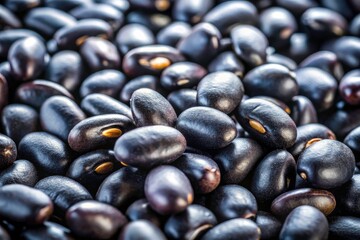 Obraz premium High-resolution close-up: forty-five black beans in a candid group photo.