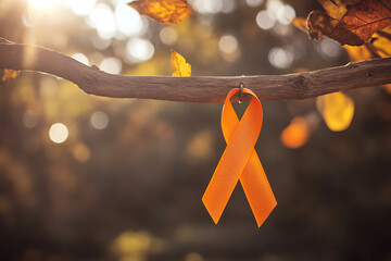 Orange ribbon symbol on a tree