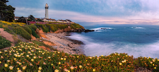 Silky water, waves by Pigeon Point Lighthouse on Northern California Pacific Ocean coast at sunset