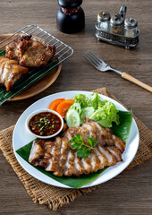Grilled pork neck Pork neck will have it inserted. This pork won't be sticky. It is popular to marinate and grill. With spicy sauce, soft and chewy, very delicious taste