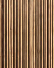 Fototapeta premium Vertical Light Brown Slatted Wall Surface