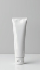 White Cosmetic Tube Mockup on Minimalist Surface